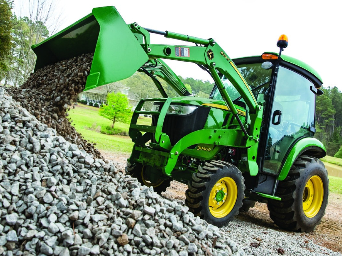 lifestyle photo of a john deere compact tractor
