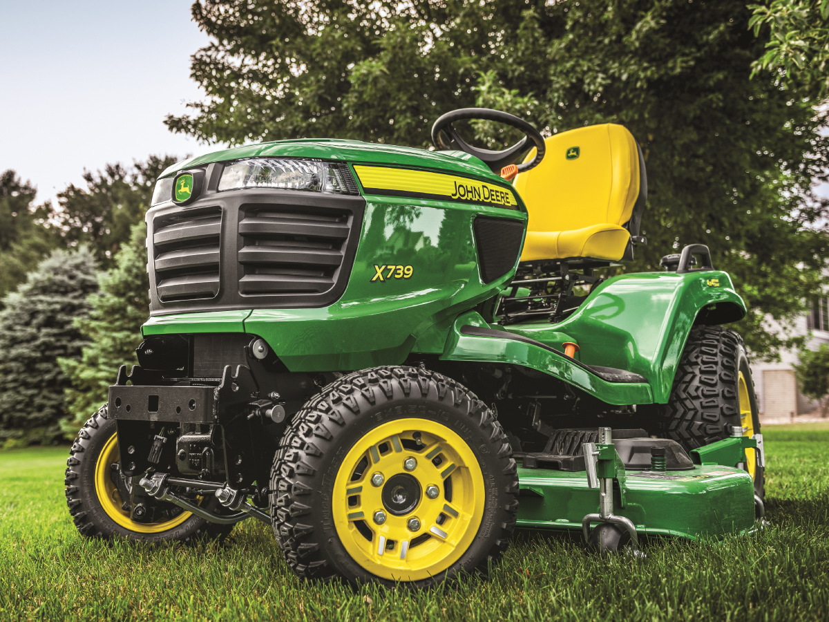 Person on a John Deere Tractor