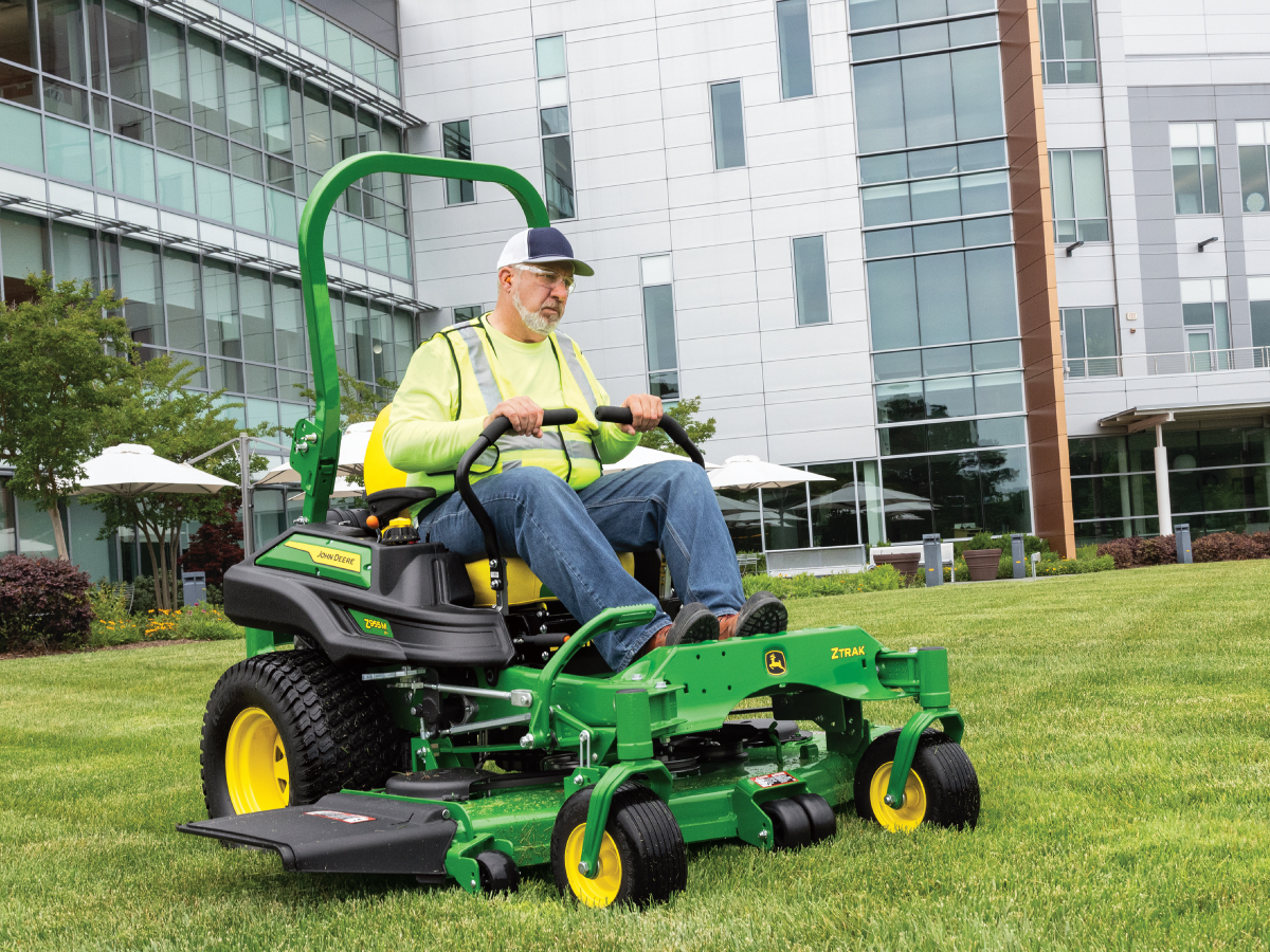 Person using Z900M John Deere Zero Turn