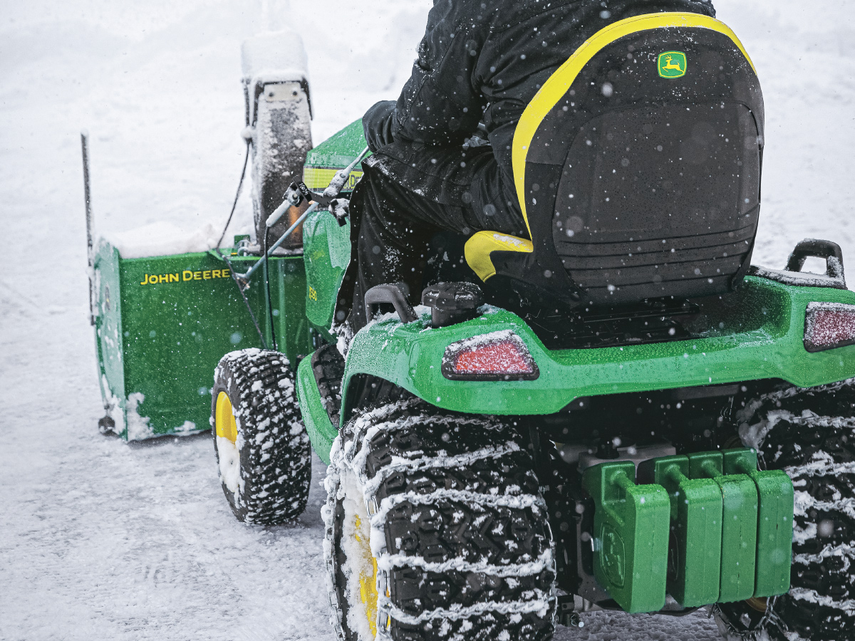 Person on John Deere X500 series